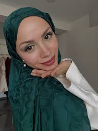 Serap K.